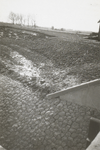 FOTO-000031 Dijkdoorbraak in de werkhaven van Rijkswaterstaat, naast het nieuwe gemaal van Rijnland, 06-04-1935