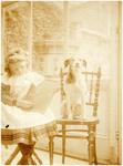 180030 Het schrijven op een lei door Louisa Petronella Michaella Henrica Maria Coovels in gezelschap van een hond, 1902 ...