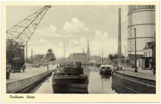 16307 Het laden en lossen van binnenvaartschepen in de haven, 1930 - 1940