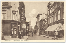 16318 Rechtestraat, met links boekhandel van Piere en op de achtergrond de toren van het stadhuis, 1940 - 1950