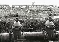 18605 Aanleg van een brug over het afwateringskanaal ter hoogte van de Locatellistraat, 1974