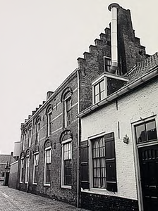 21312 Latijnse School aan de Schoolstraat, in gebruik als meubelfabriek, ca. 1970