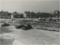 130203 Dopstraat, wegwerkzaamheden aan de Runstraat, gezien vanaf de parkeerplaats bij de brandweer, 1960 - 1970