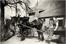 145092 Anna ( Anneke ) Bos zittend op paard en wagen, ca. 1955