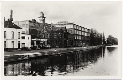 103090 Kanaaldijk N.W., gezien vanaf de 'Havenweg' met zicht op de fabriek van J.A. Raymakers en Co., 1930 - 1940