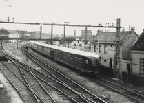 254008 Het vertrekken van een trein naar Best ter hoogte van de splitsing met het Bels Lijntje, 20-05-1938