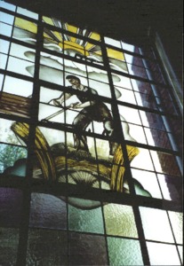  Glas-in-loodraam met schildering van graan maaiende man Nassaulaan 4, Groningen 100528
