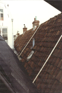  Zicht op daken en achtergevel nr. 54 Oude Ebbingestraat 52, 54, Butjesstraat 1, 3, Groningen 102966, 100704