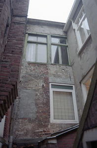  Gevel met rollagen van dichtgezette vensters en later aangebrachte vensters Vismarkt 6, Groningen 100763