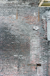  Muurwerk met dichtgezet kloostervenster en muurankers Steentilstraat 38, Groningen 103345