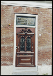  voordeur met houtgesneden ornamenten Oosterweg 56, Groningen 101378