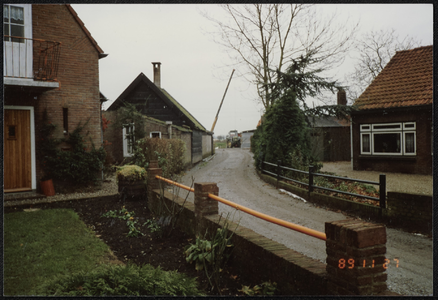  Rechts de woning van fam. Berlang (nr. 8), links fam. van Hengstum