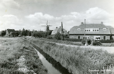 PB2550 Het Rode Dorp, met de molen op de achtergrond, 1965