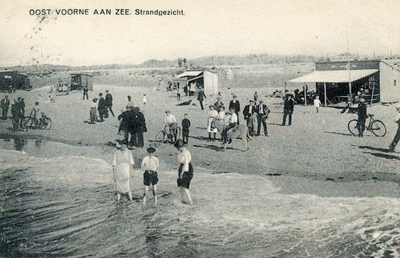PB4901 Drukte op het strand: ezeltje rijden, pootje baden, strandtenten, ca. 1922