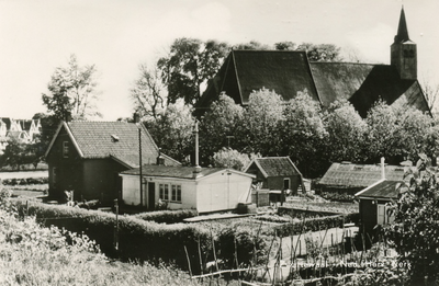 PB9910 Dorpsgezicht met de kerk en woningen, 1961