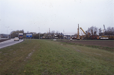 DIA02440 De N57 richting de kruising met de Groene Kruisweg, kijkje op industrieterrein Seggelant; ca. 1996