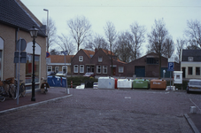 DIA02610 Kijkje op het Scharloo vanuit de Varkensstraat, links de EDAH; ca. 1991