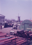 DIA44430 De molen Nooitgedacht, gezien vanaf het terrein van Van Hamburg; ca. 1969