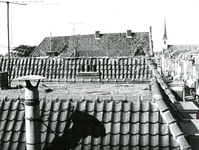 BR_VOORSTRAAT_018 Kijkje op de daken van de huizen langs de Voorstraat vanaf het torentje van het Stadhuis op de Markt; ...