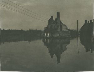 B-603 De wijk 't Zand (rechts vermoedelijk de Poelendaeleweg) te Middelburg tijdens de inundatie