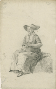 903-10 Een Walcherse vrouw met een mand en een hoed, zittend