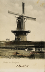 9882 Molen te Kortgene. Gezicht op de molen De Korenbloem te Kortgene met molenaars, een paard en een rijtuig