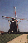 323-2 Gezicht op de windkorenmolen Nooit Gedacht aan de Molenweg te Arnemuiden