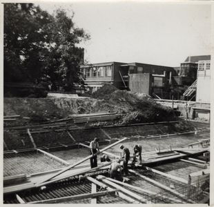 388-7 Het leggen van een rij loopbruggen en het storten van beton voor de uitbreiding van het Gasthuis te Middelburg