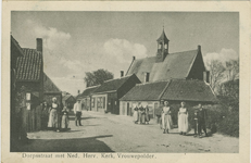 455-1057 Dorpsstraat met Ned. Herv. Kerk, Vrouwepolder.. Poserende personen in dracht op de Dorpsdijk te Vrouwenpolder