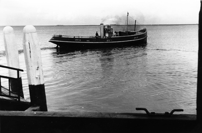 605-7-34 De veerboot Zandvliet van de veerdienst Veere-Kamperland tijdens één van de laatste afvaarten