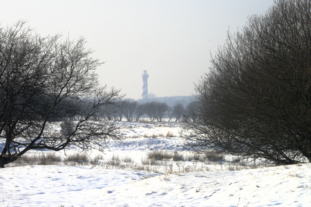 X-4909 Haamstede. Kloosterweg. Vuurtoren Westerlicht gezien vanaf de Kloosterweg bij villa Molenbosch 