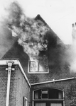 A-9647 Zierikzee. Manhuisstraat 23. De Vrijwillige Brandweer Zierikzee in actie tijdens de felle brand in een woonhuis.