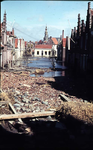 RK-1470 Zierikzee. Watersnoodramp 1953. Gezicht vanuit de Hoofdpoortstraat op de Breedstraat.