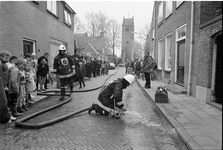 JVH-1577 Oosterland. Kerkstraat. 'Brand' in pastorie Hervormde Kerk. Regionale brandweerwedstrijden, die werden ...