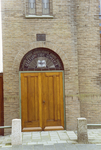 31 De ingang van de kerk der Gereformeerde Gemeente te Axel