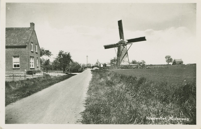 NVL-P-65 Nieuwvliet, Molenweg. De Molenweg met de molen te Nieuwvliet