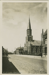 SJS-P-12 St. Jansteen, Dorpsstraat. De Dorpsstraat (later Hoofdstraat) te Sint Jansteen met de Rooms-katholieke kerk