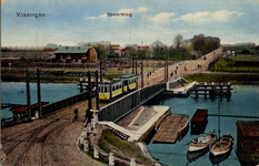 1129 'Vlissingen. Spoorbrug'. De Keersluisbrug, gebouwd in 1872 over het Kanaal door Walcheren. Op de achtergrond ziet ...