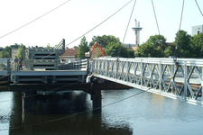 41248 Het doortrekken van de Koningsweg via een brug over de Dokhaven. De nieuwe weg zal aansluiten op de Commandoweg. ...