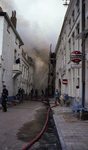 47529 Vier kinderen kwamen om het leven na een grote uitslaande brand in de Beursstraat, waarbij diverse panden uitbrandden.