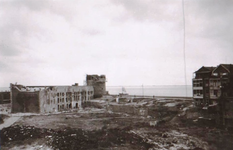57923 De Westpoort of of Gevangentoren met de verwoeste Bomvrije Kazerne. De foto is genomen vanaf de achterzijde van ...