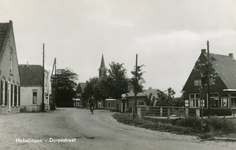 PB2925 Kijkje op de Dorpsstraat, met de kerk en een esso station, 1961