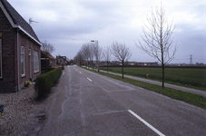 DIA68160 De Veckdijk, met op de achtergrond het dorp Vierpolders; ca. 1991
