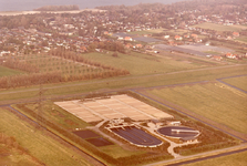 OV_LUCHTFOTO_29 Luchtfoto van de Rioolwaterzuiveringsinstallatie. Op de achtergrond de Brielse Maas en het ...