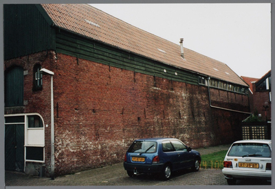 WAT001003065 Hoornsebuurt 22, rechterzijgevel loods gebroeders C en D. Prins.