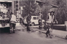 1797 - Brandweer bezig met opruimen van een oliespoor op verschillende wegen.