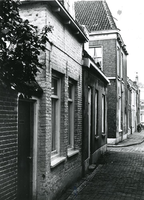 F012222 Schapensteeg nr. 25 gezien naar de hoek met de Buitenhofstraat en verder naar de Burgwal.