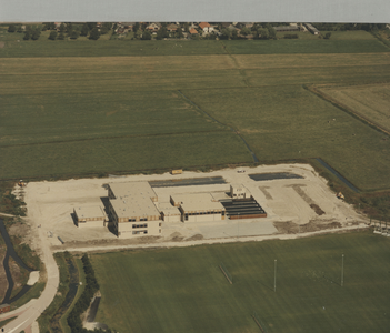 F014073 Luchtfoto - Almere College in aanbouw.