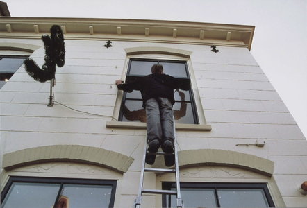  Glazenwassers aan het werk.