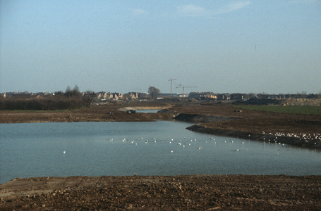  Zicht vanuit het westen over de groenzone, het Imkerspark, met rechts de woningen aan de Lupineoord.